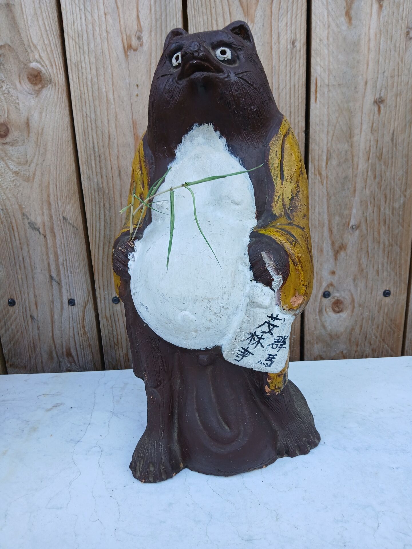 Tanuki statue in handcrafted terracotta