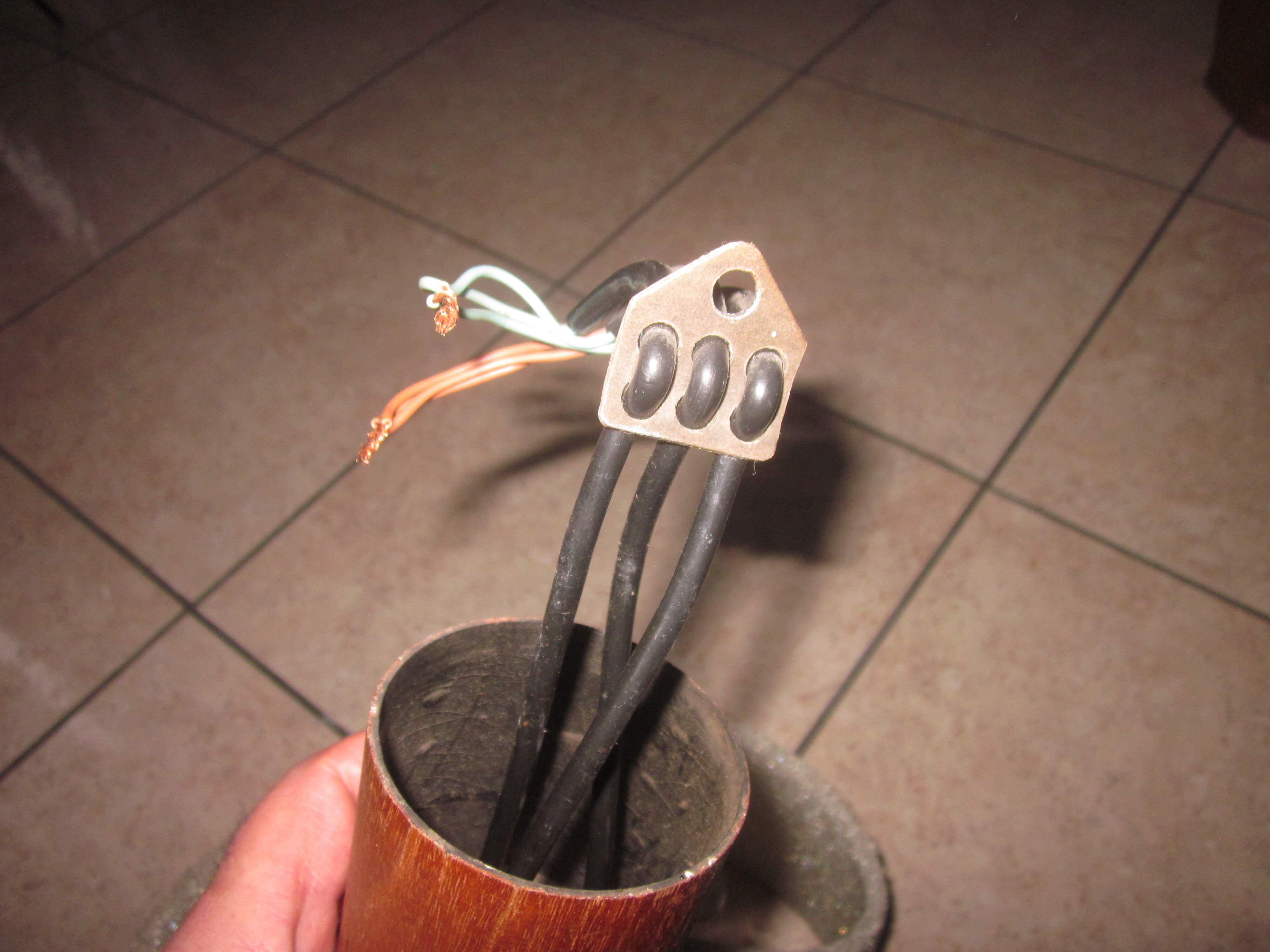 Scandinavian teak chandelier and perplexed