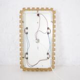 Large luminous acrylic mirror.