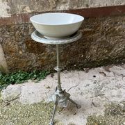Side table pedestal table with silver cast iron plant