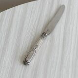 Set of 8 silver metal knives
