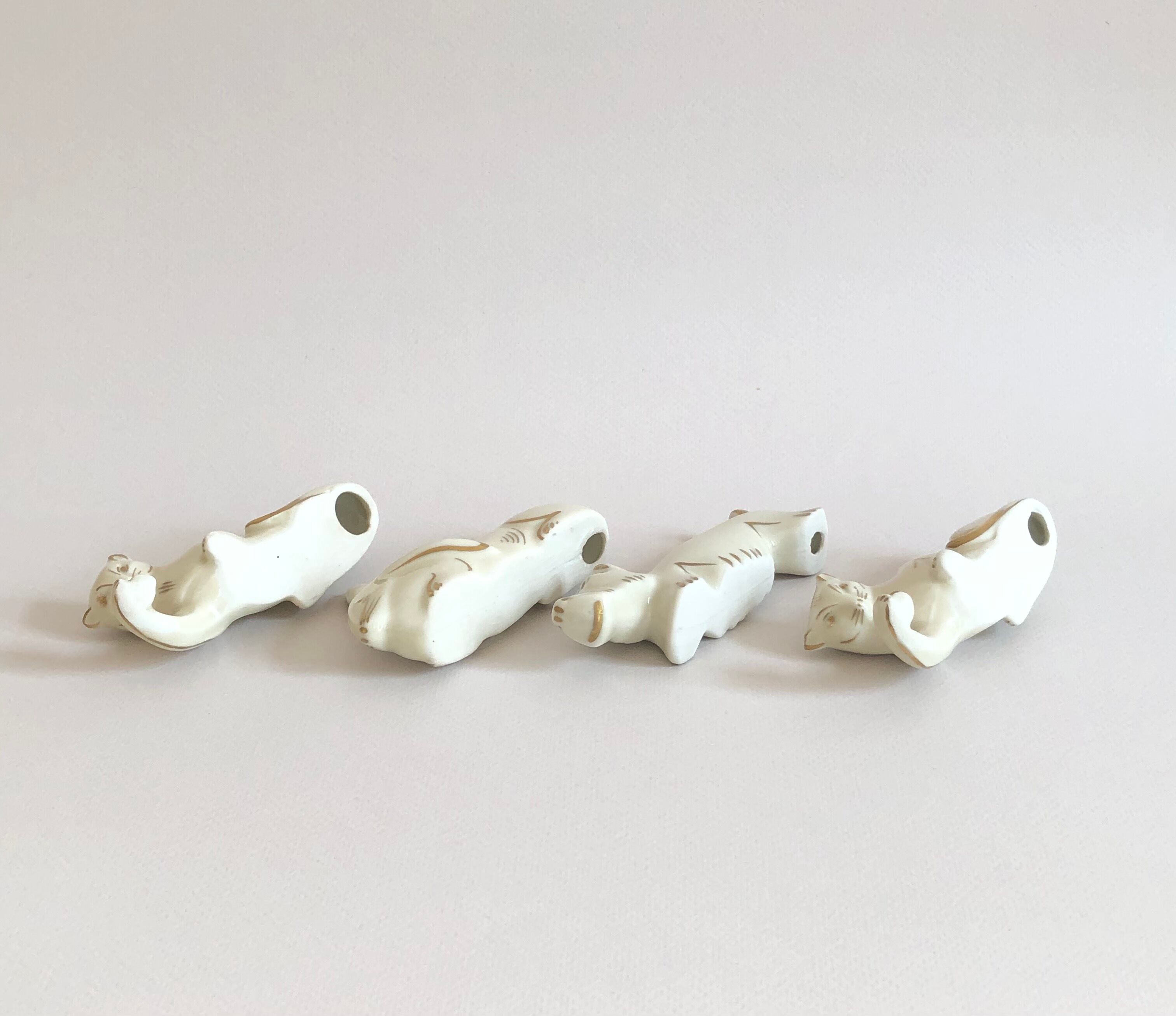 Set of 8 art deco ceramic animal knife holders