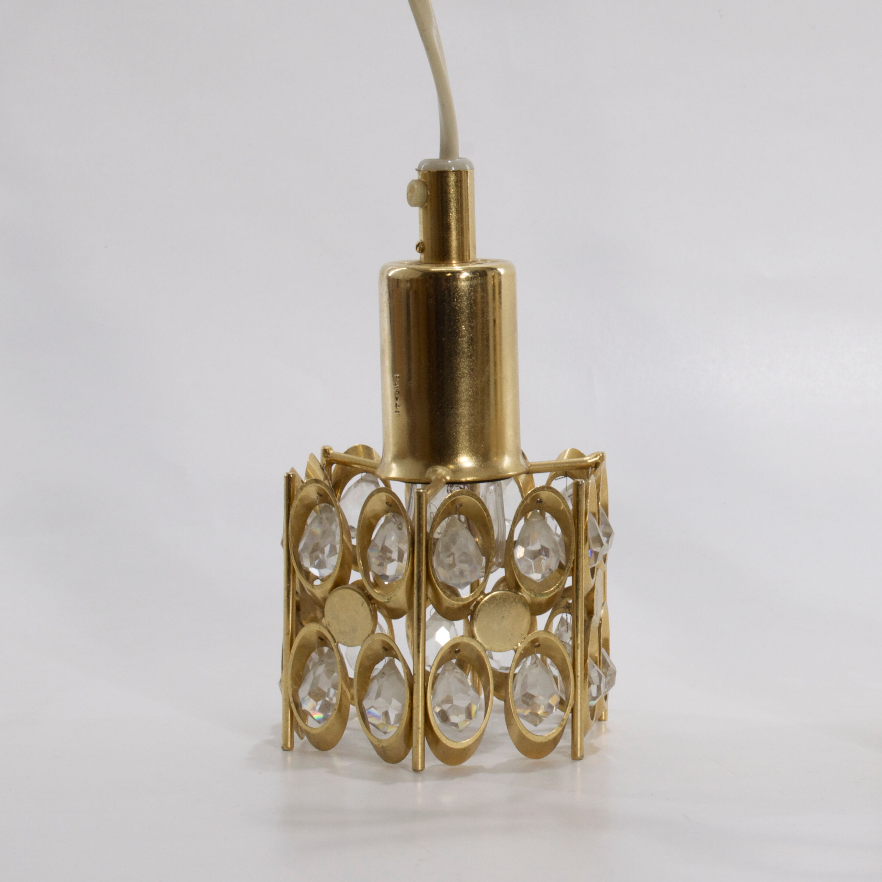 Two pendant lights in gilded brass and crystal, by Palwa, design 1960