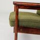 Fauteuil rétro en tissu boucle vert, forme ergonomique