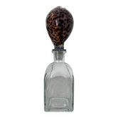 Bouteille avec bouchon coquillage