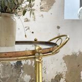 Cart serves brass bar