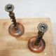 Paire de bougeoirs anciens en bois et bronze