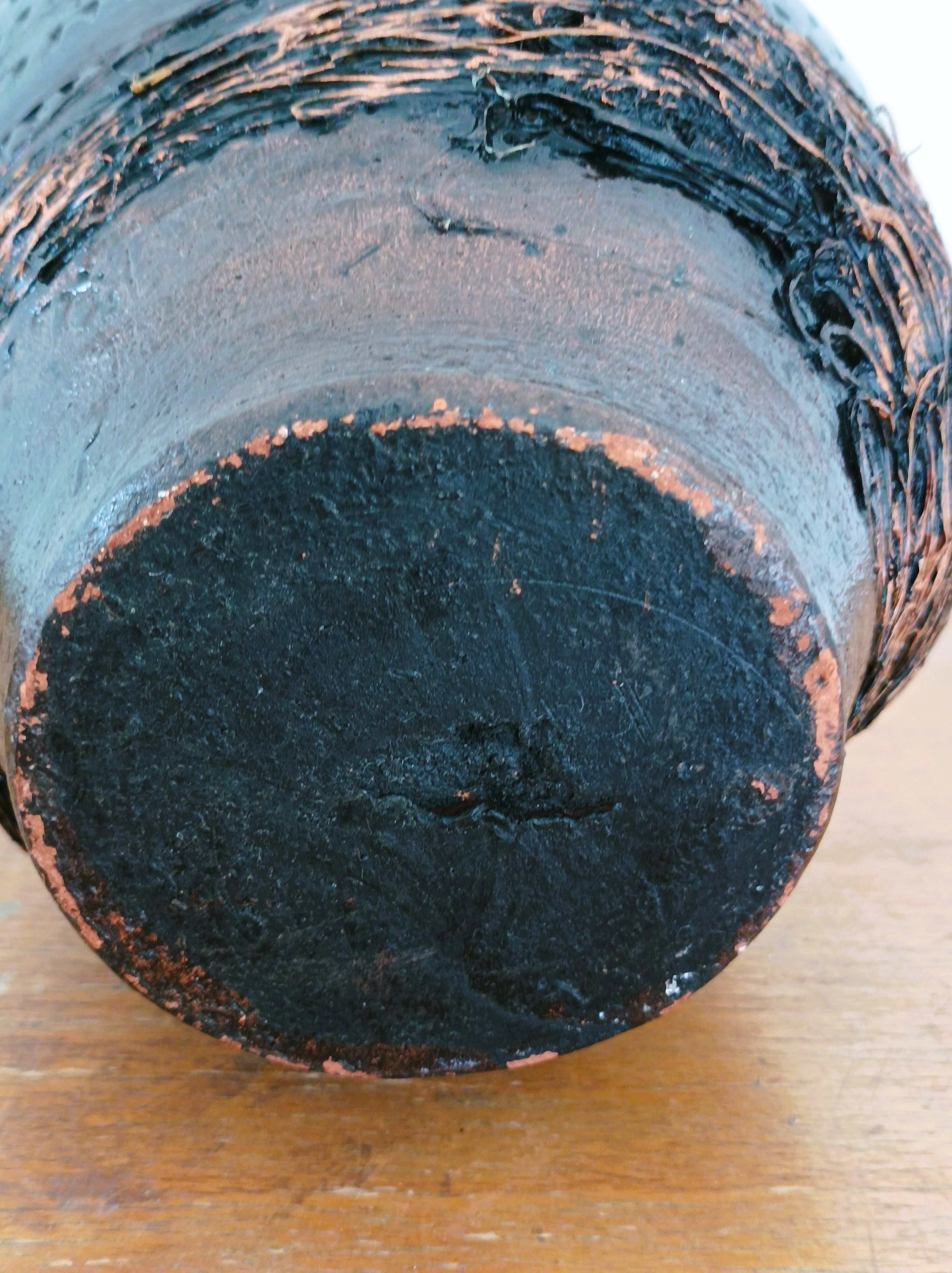 Black varnished terracotta pot