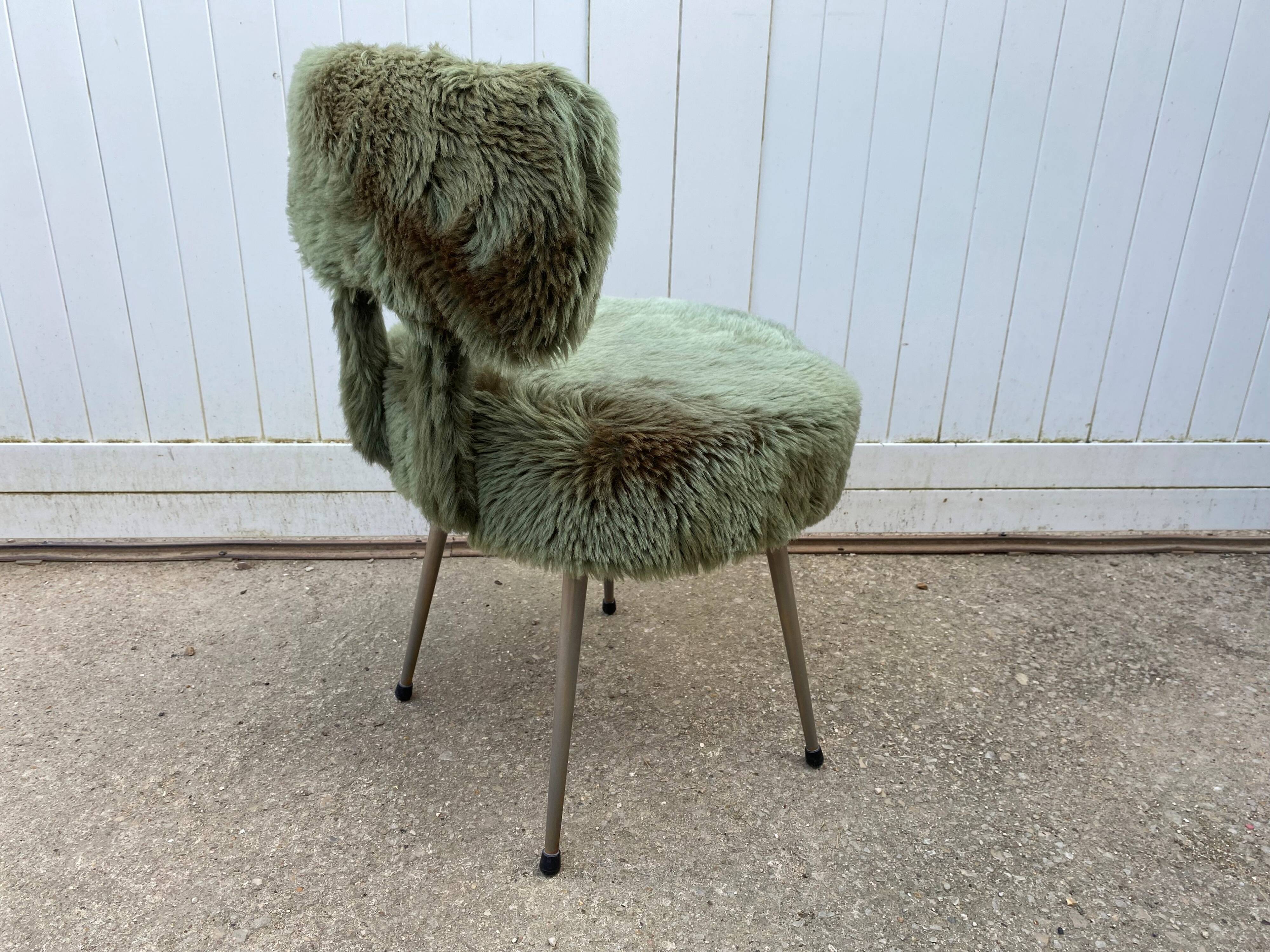 Vintage green furry chair from the 1960s