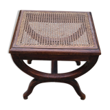 Cross-footed cane stool