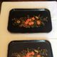 Black wooden tray with gilding and Russian motifs painted with red and green flowers