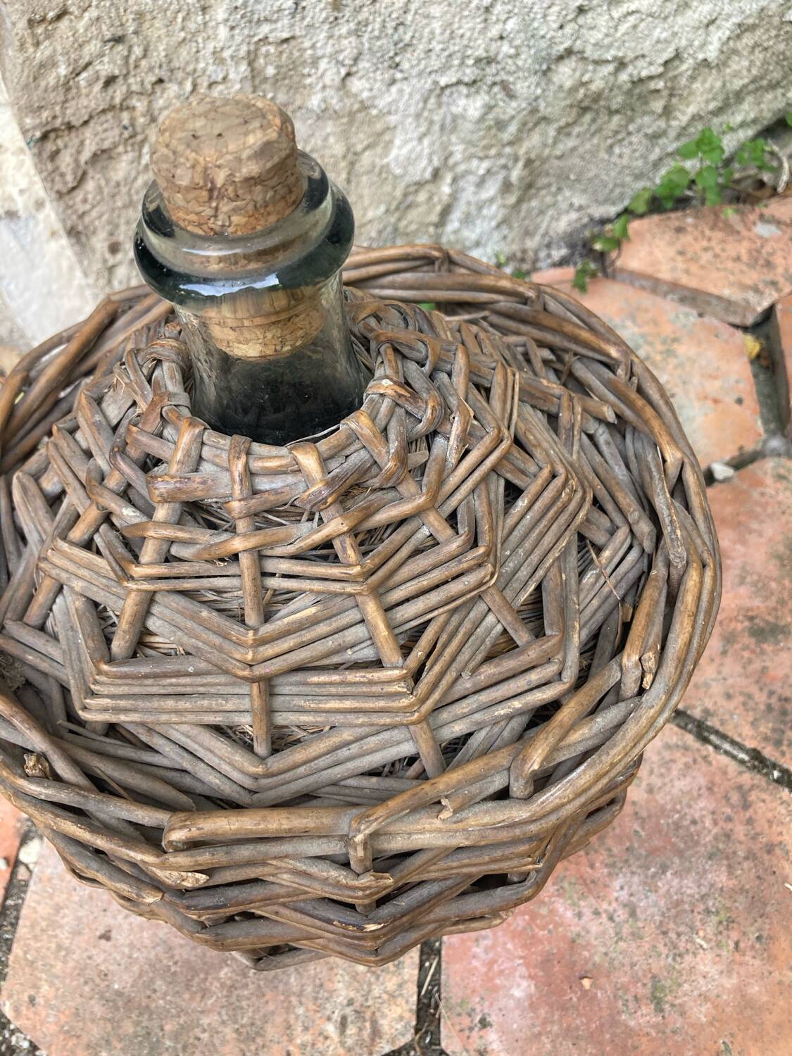 Vintage wicker demijohn