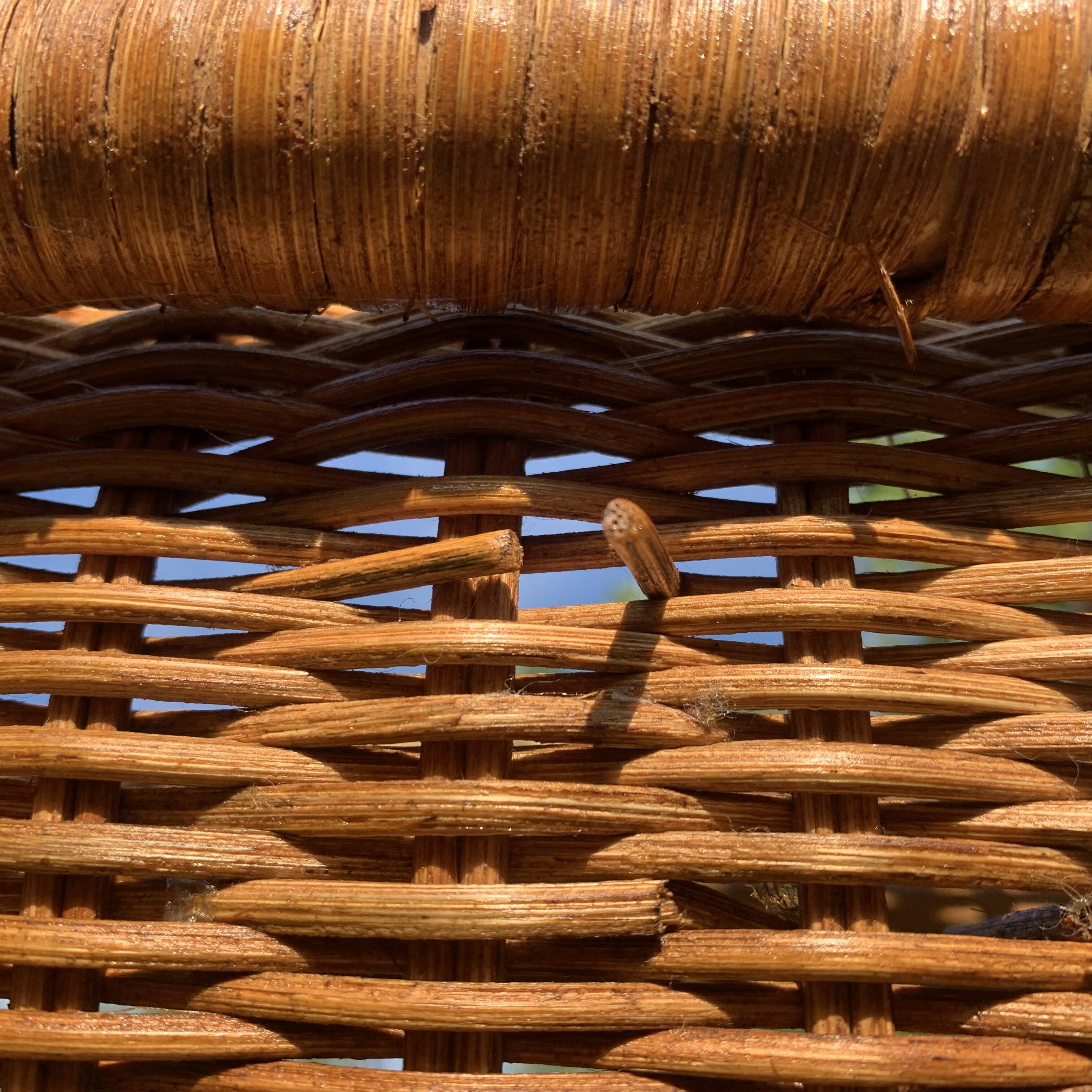 Vintage wicker and bamboo magazine rack
