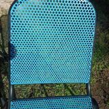Openwork metal chair