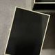 Pair of black lacquered and brass bedside tables, Roche Bobois 1970