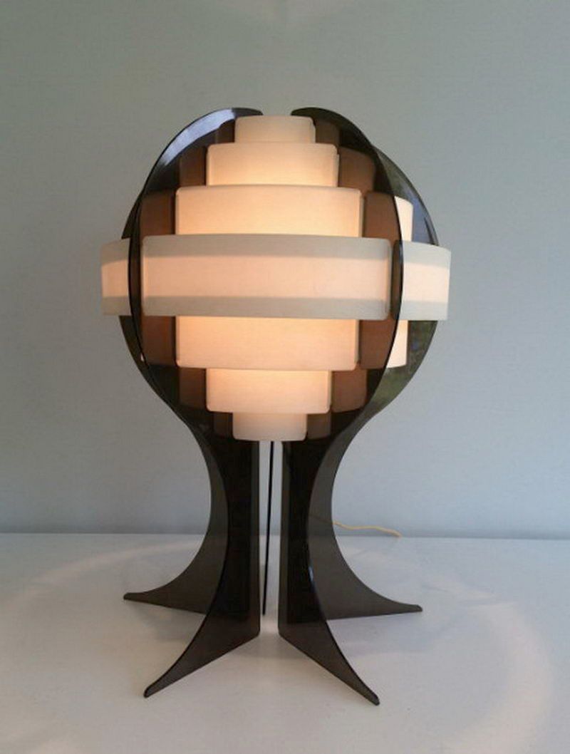 Modernist lamp in plexiglass and white plastic strips.
