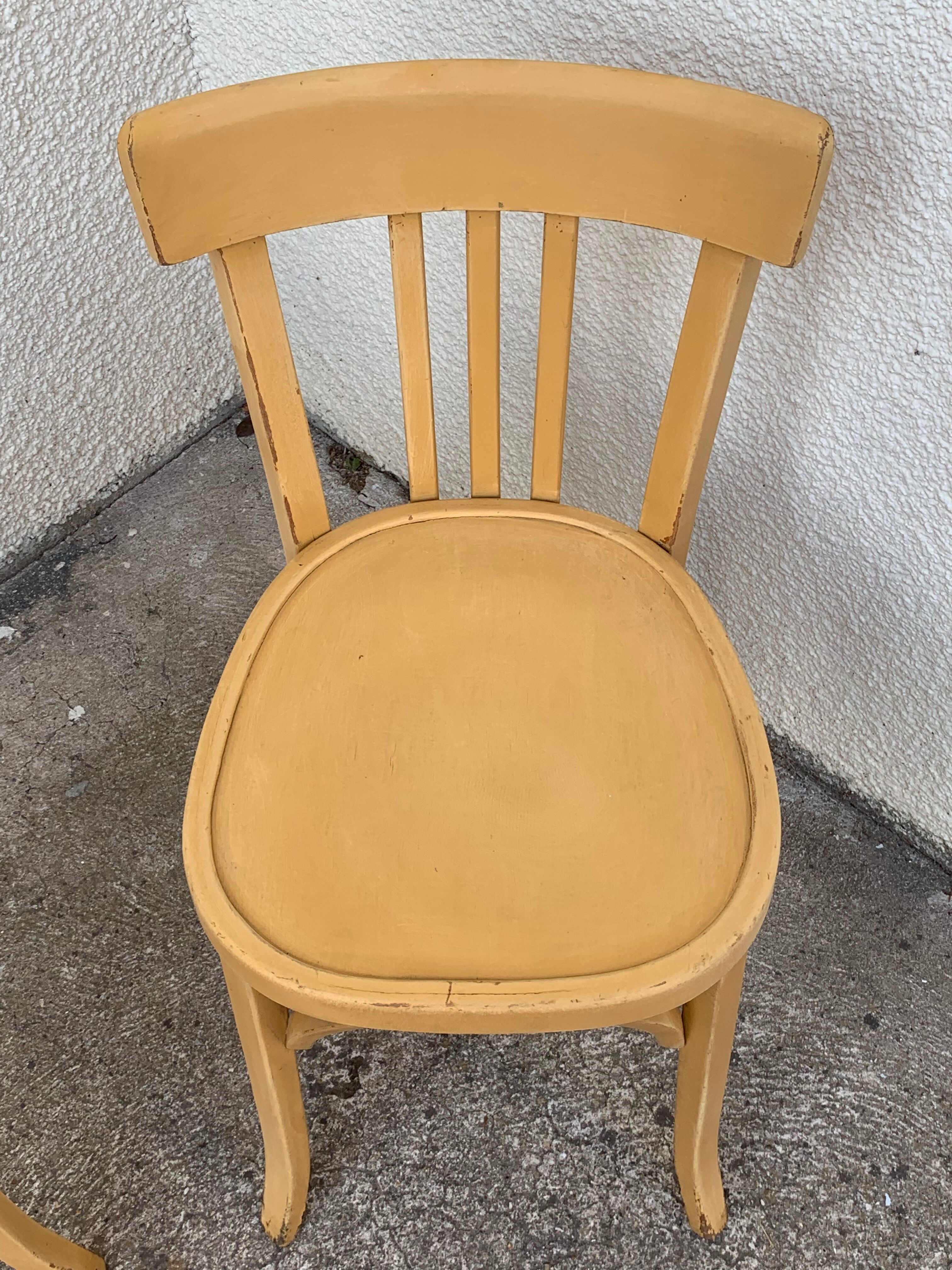 Paire de chaises bistrot Baumann patine vintage