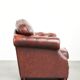 Brown cow leather Chesterfield armchair in a unique design