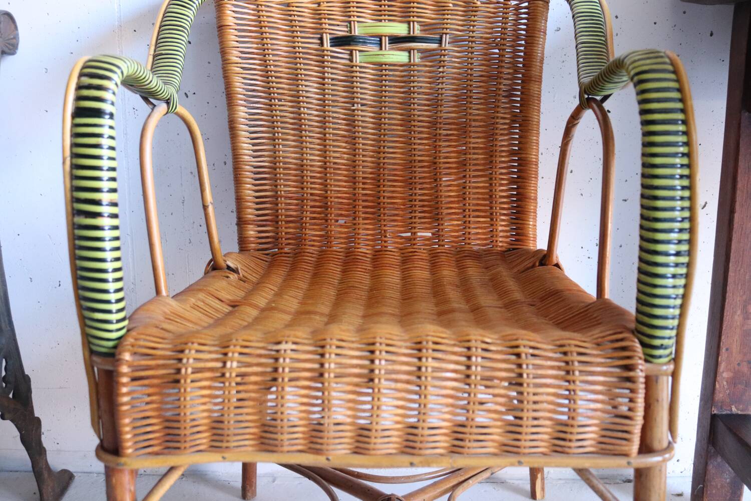 Antique two-tone rattan armchair