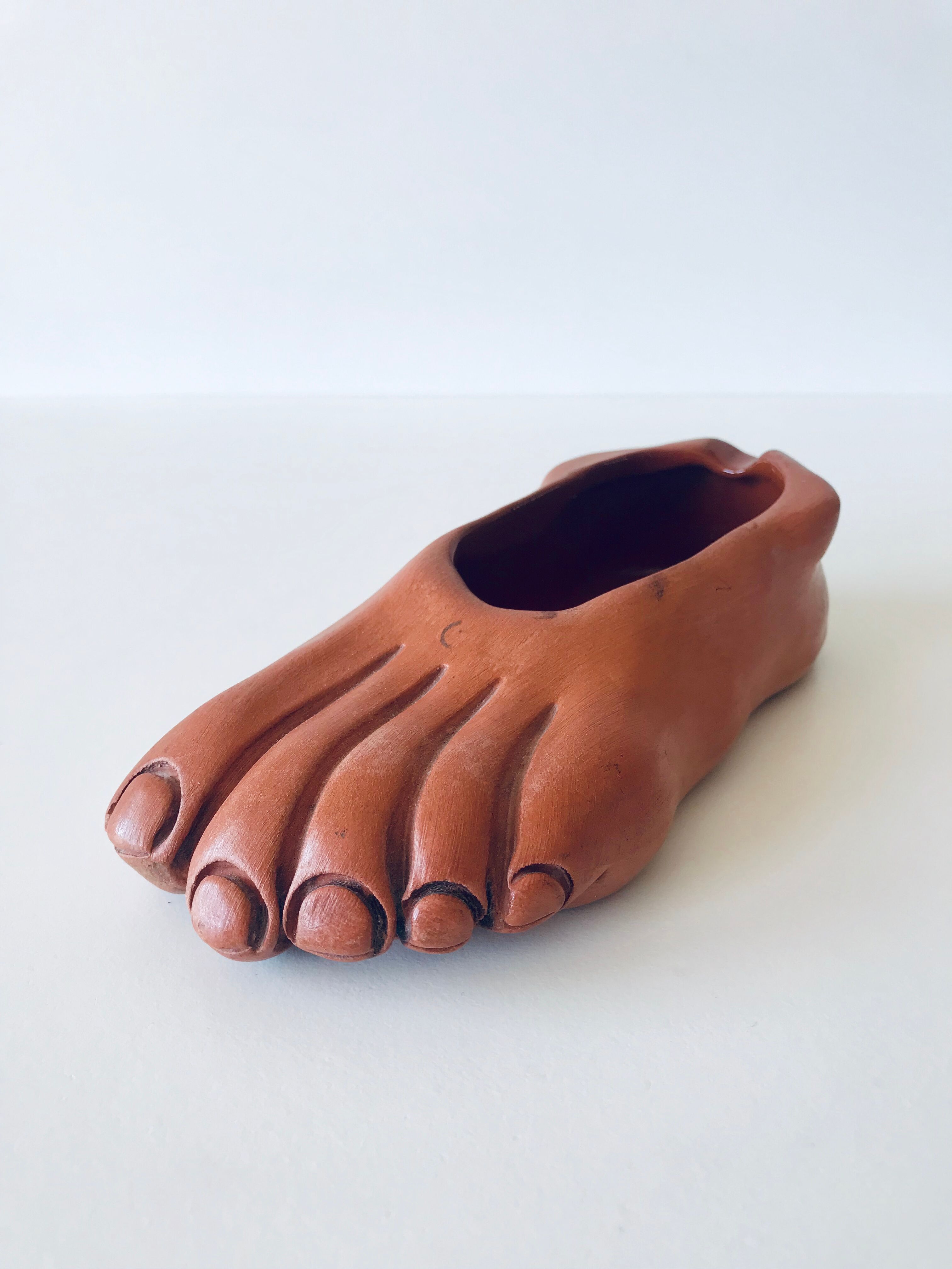 Foot ashtray signed Jean Marais