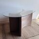Italian side table with carved rattan and glass top.