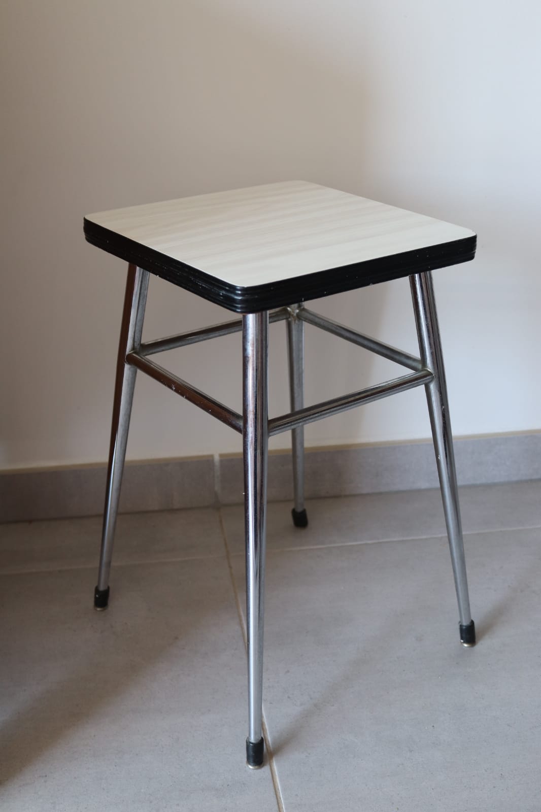 White formica stool