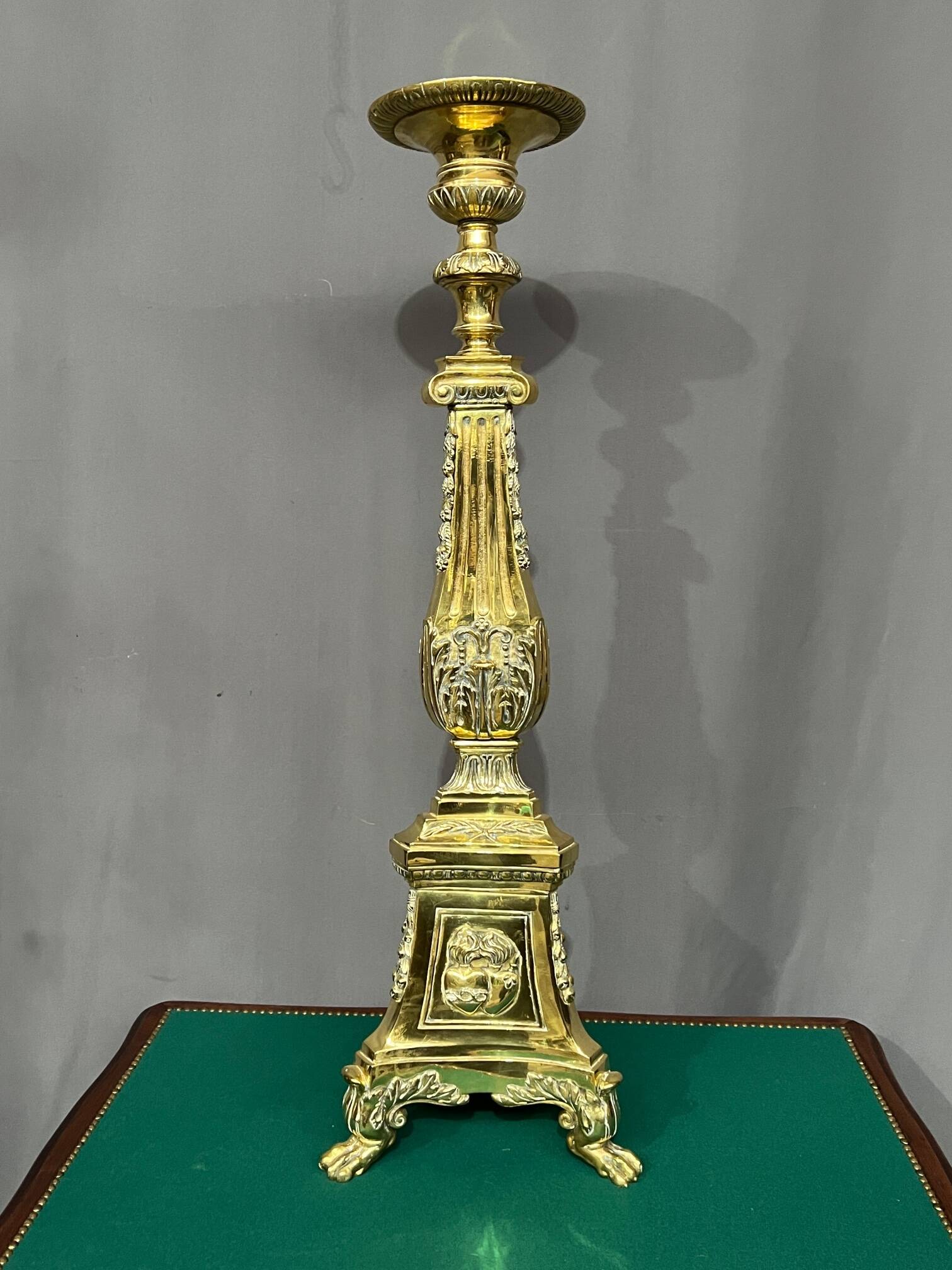 Large solid bronze floor candle holder.