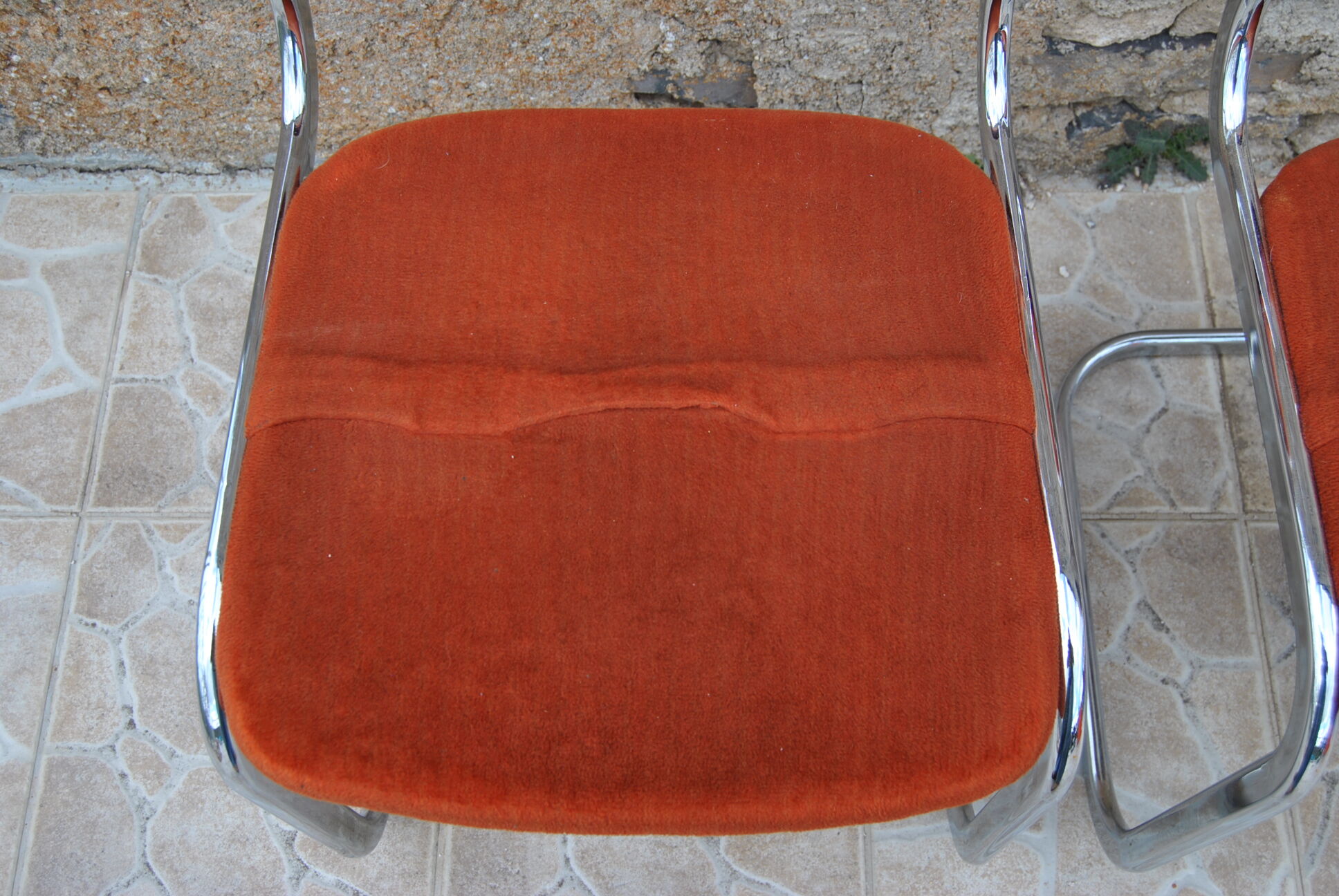 Pair of orange velvet chairs Roche Bobois 70s
