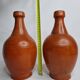 Pair of glazed terracotta jars, 26 cm