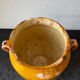 Old grease pot in glazed yellow terracotta, France nineteenth century