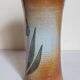 Vintage enameled stoneware potter's diabolo vase