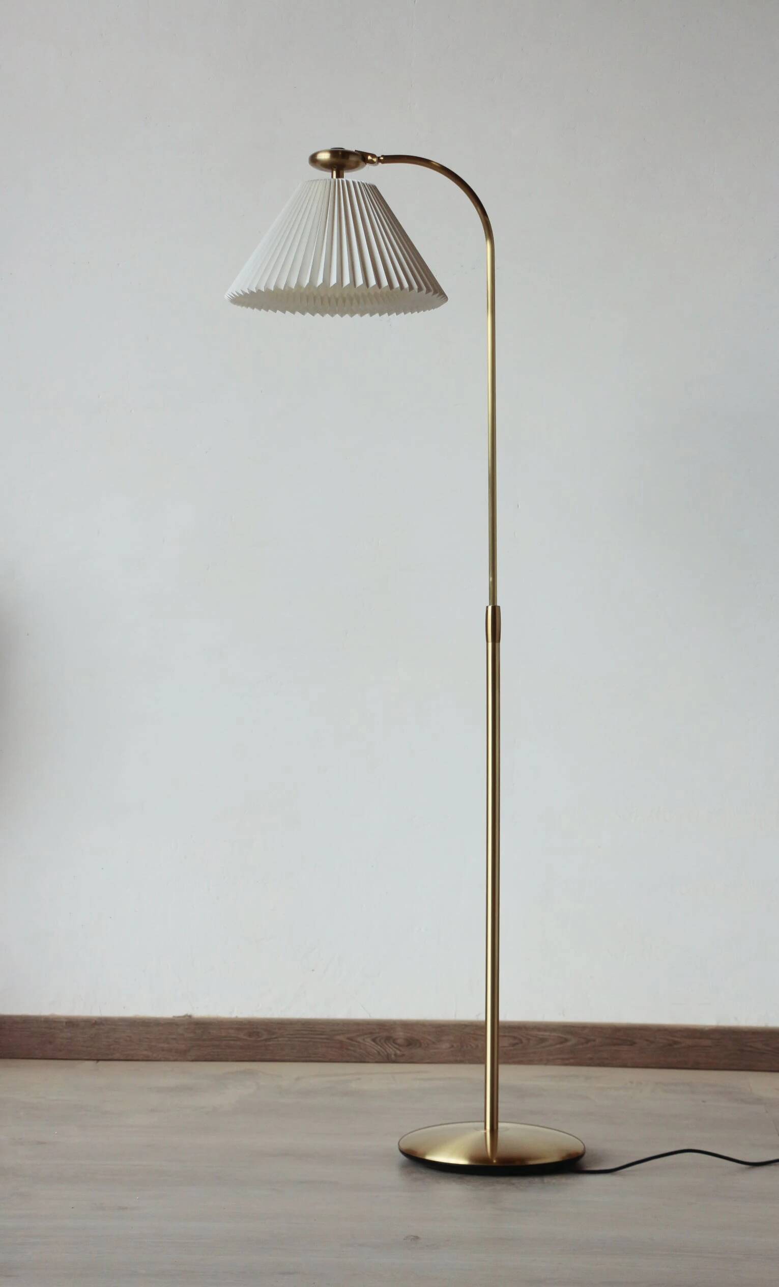 Le Klint 340 floor lamp in brass – design by Philip Bro Ludvigsen