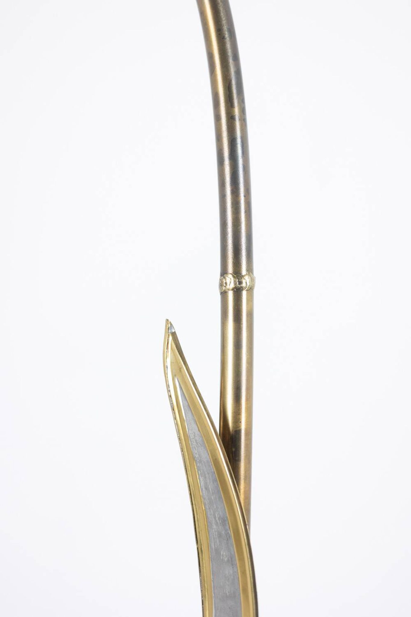 Maison Honoré. Lampadaire en laiton doré. Circa 1970.