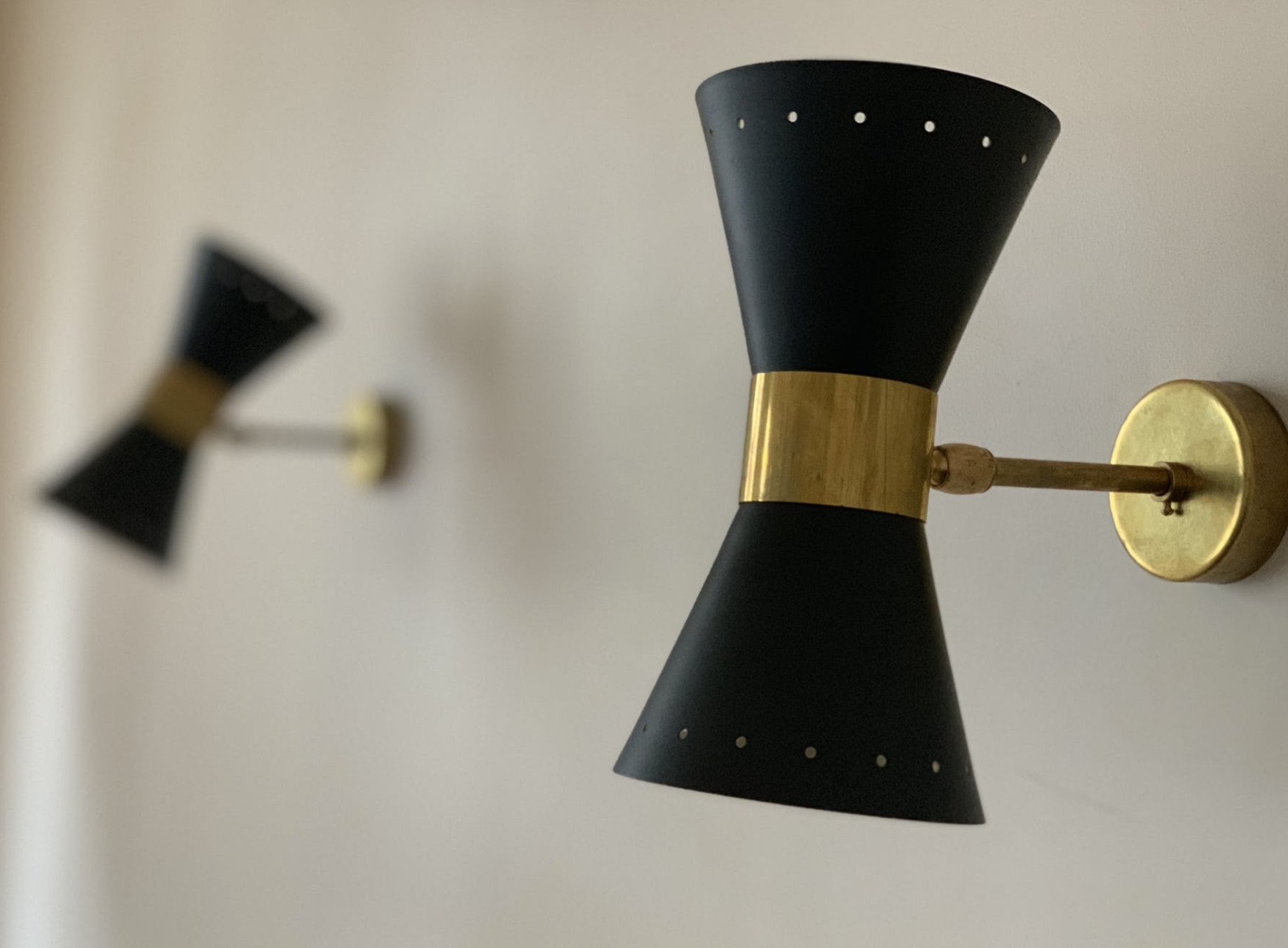 Pair of black Italian diabolo appliques