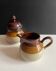Milk jug + sugar bowl set in enamelled stoneware