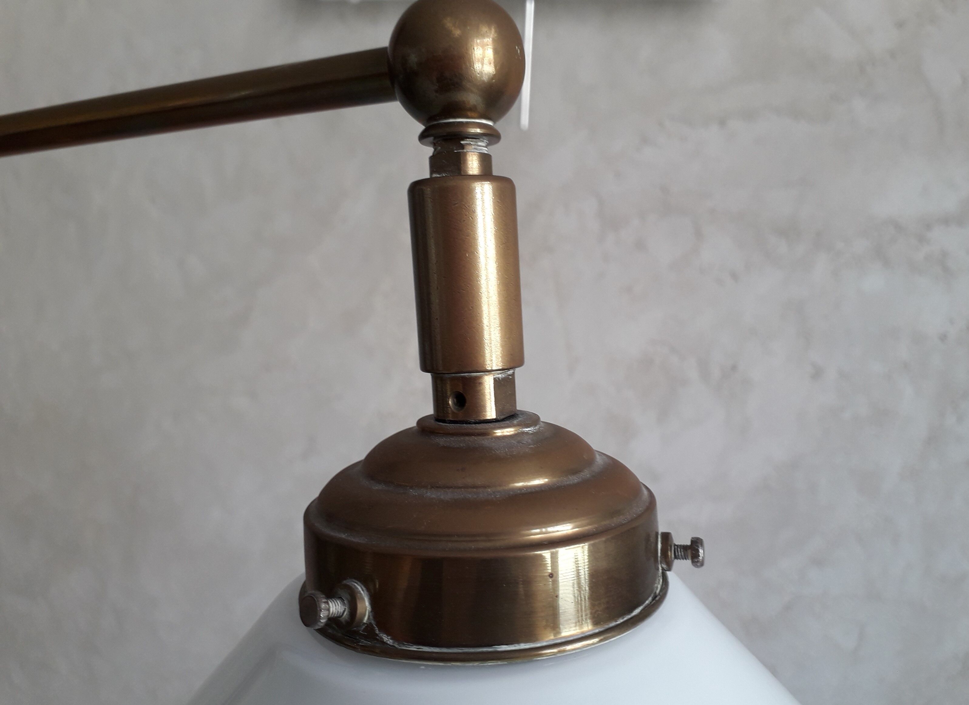 Articulated brass floor lamp