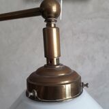 Articulated brass floor lamp
