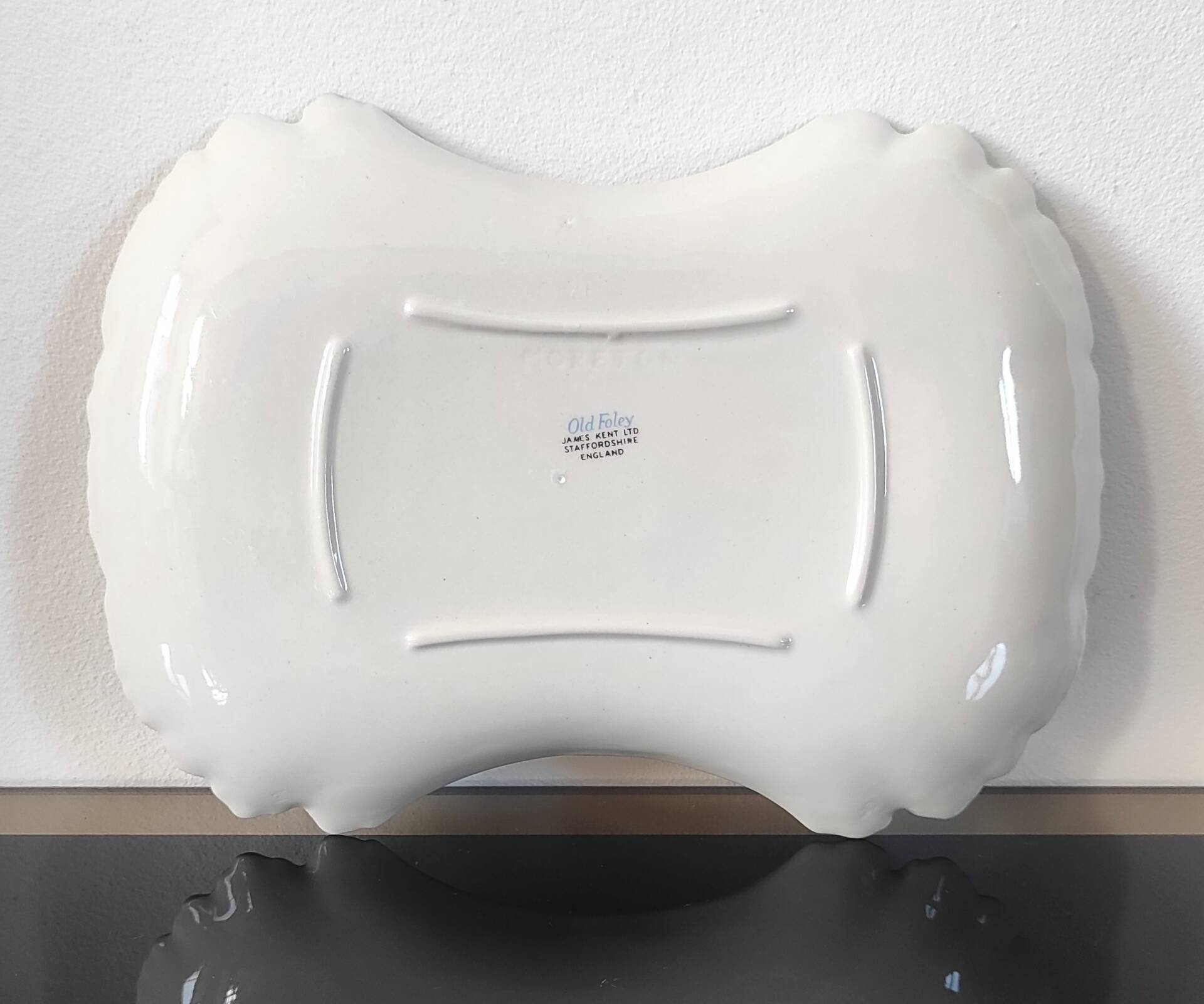 Vintage cut-out plate in earthenware