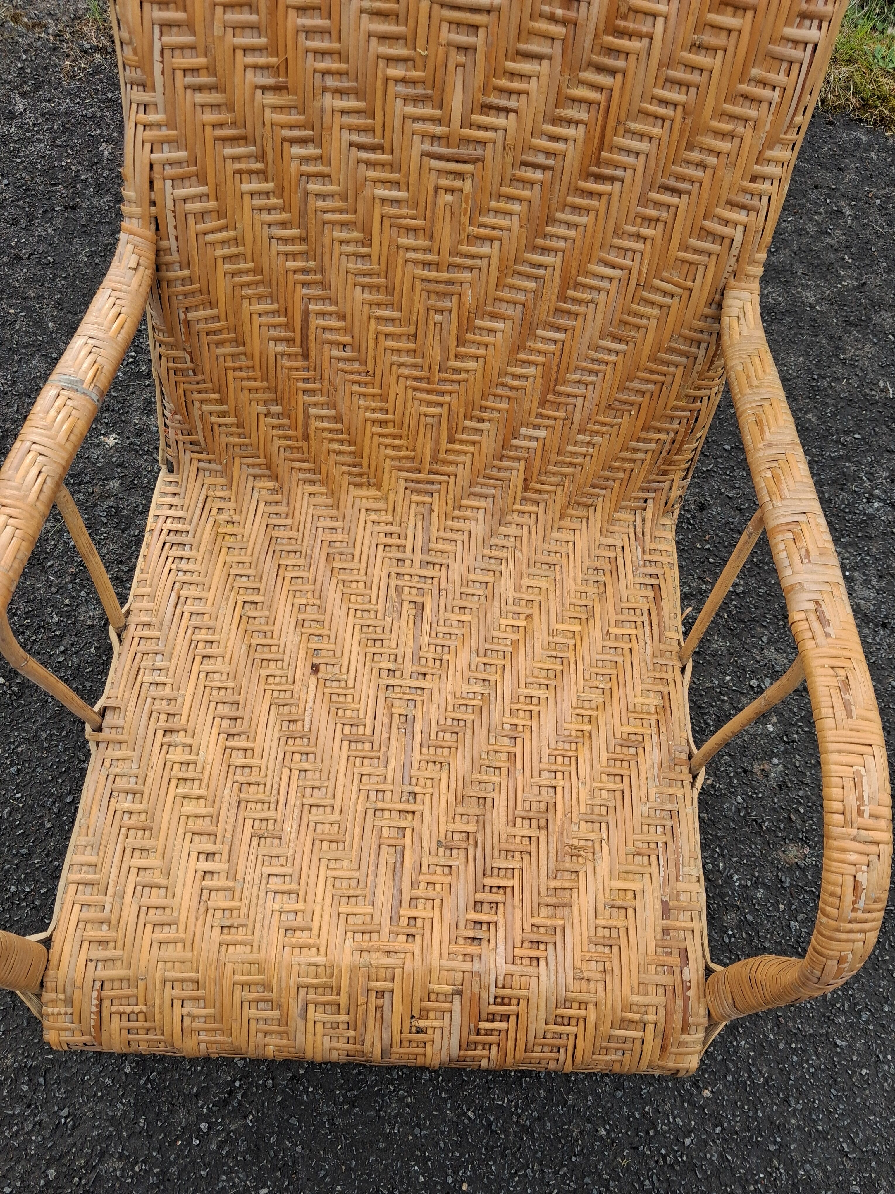 Antique high-back rattan armchair