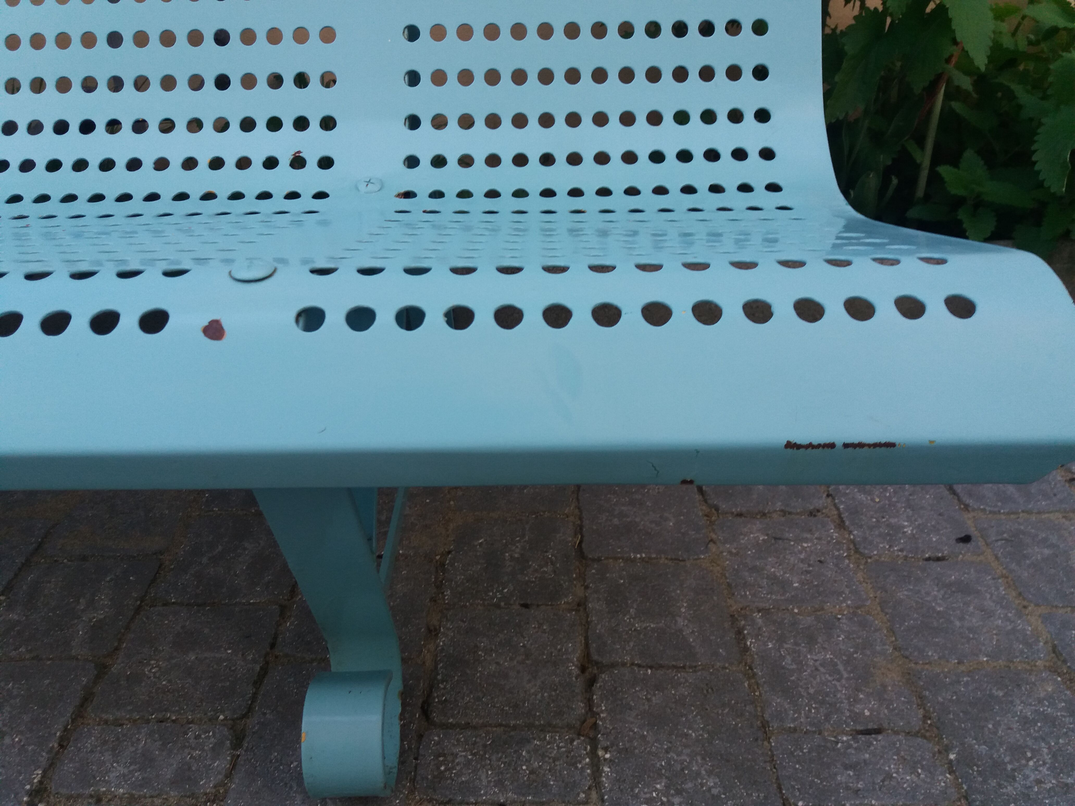 Vintage garden bench in metal