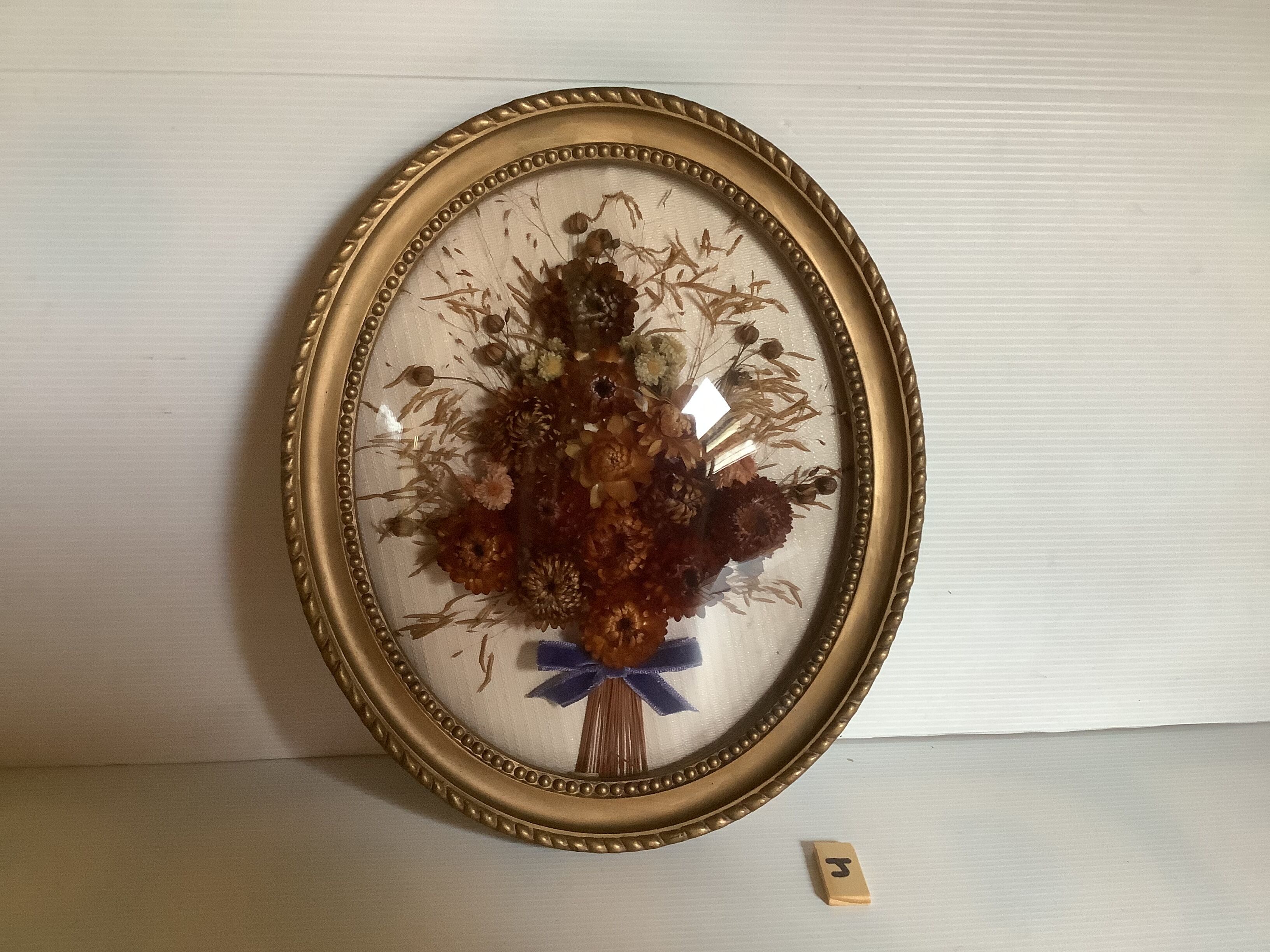Old oval domed glass frame natural dried flowers