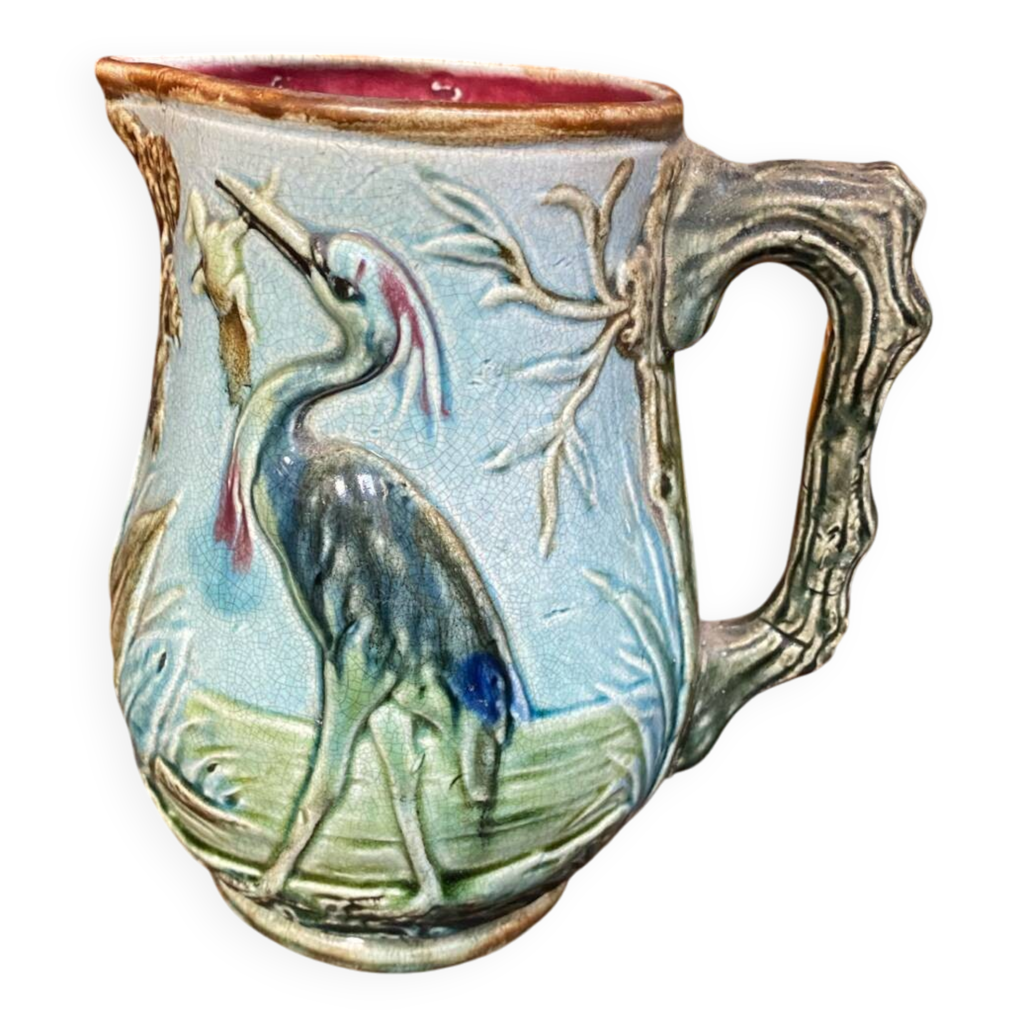 Majolica pitcher depicting a heron, 1900