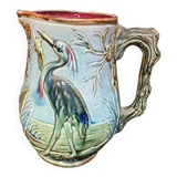 Majolica pitcher depicting a heron, 1900