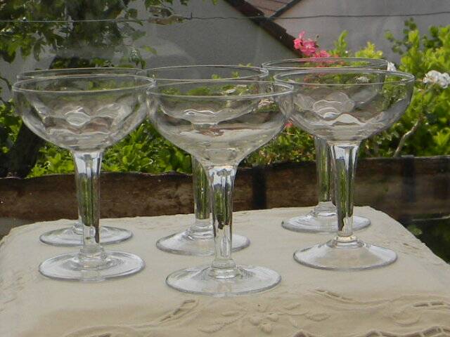 Set of 6 antique glass champagne glasses.