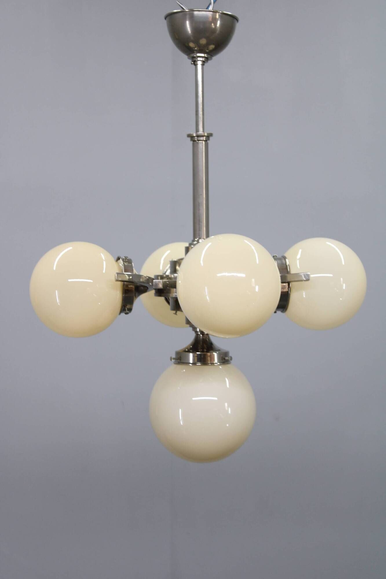 Czechoslovak Art Deco nickel chandelier with five opaline glass globes