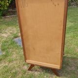 Tall chest of drawers in wood and rattan with splayed legs