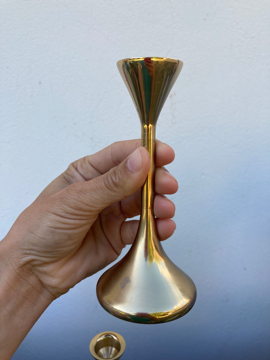 Duo of Scandinavian candle holders in gilded brass