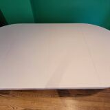 Ligne Roset table in glossy white lacquer, chrome legs, 2 extensions.