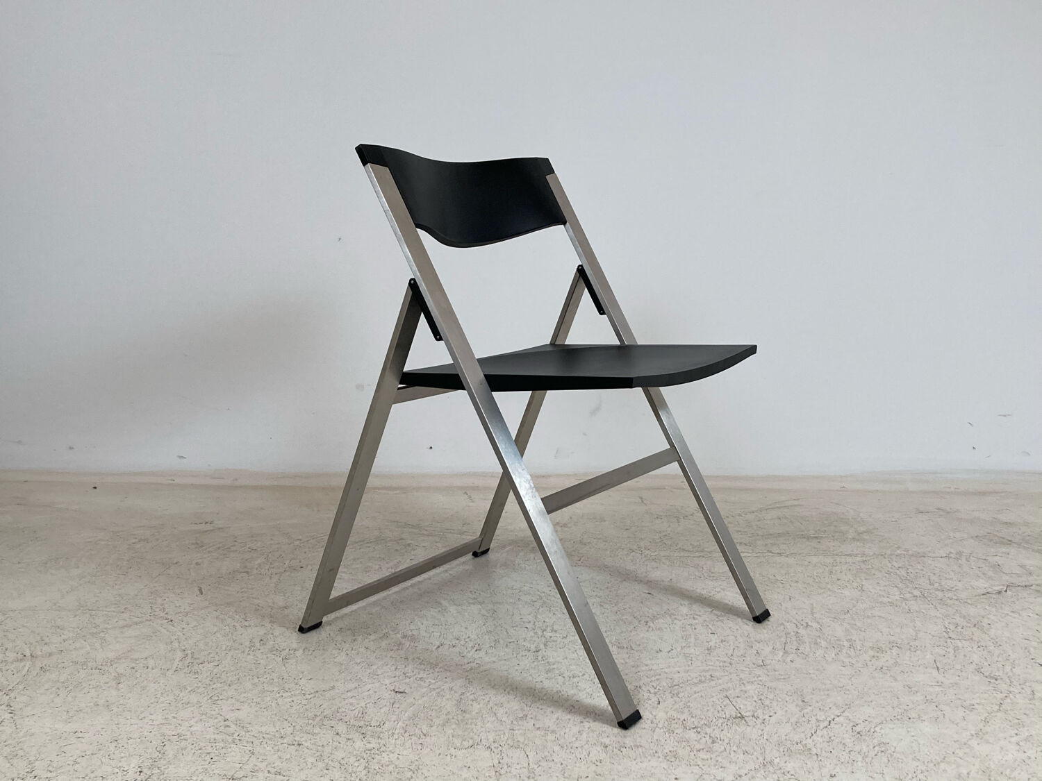 P08 folding chairs by Justus Kolberg for Tecno 1991