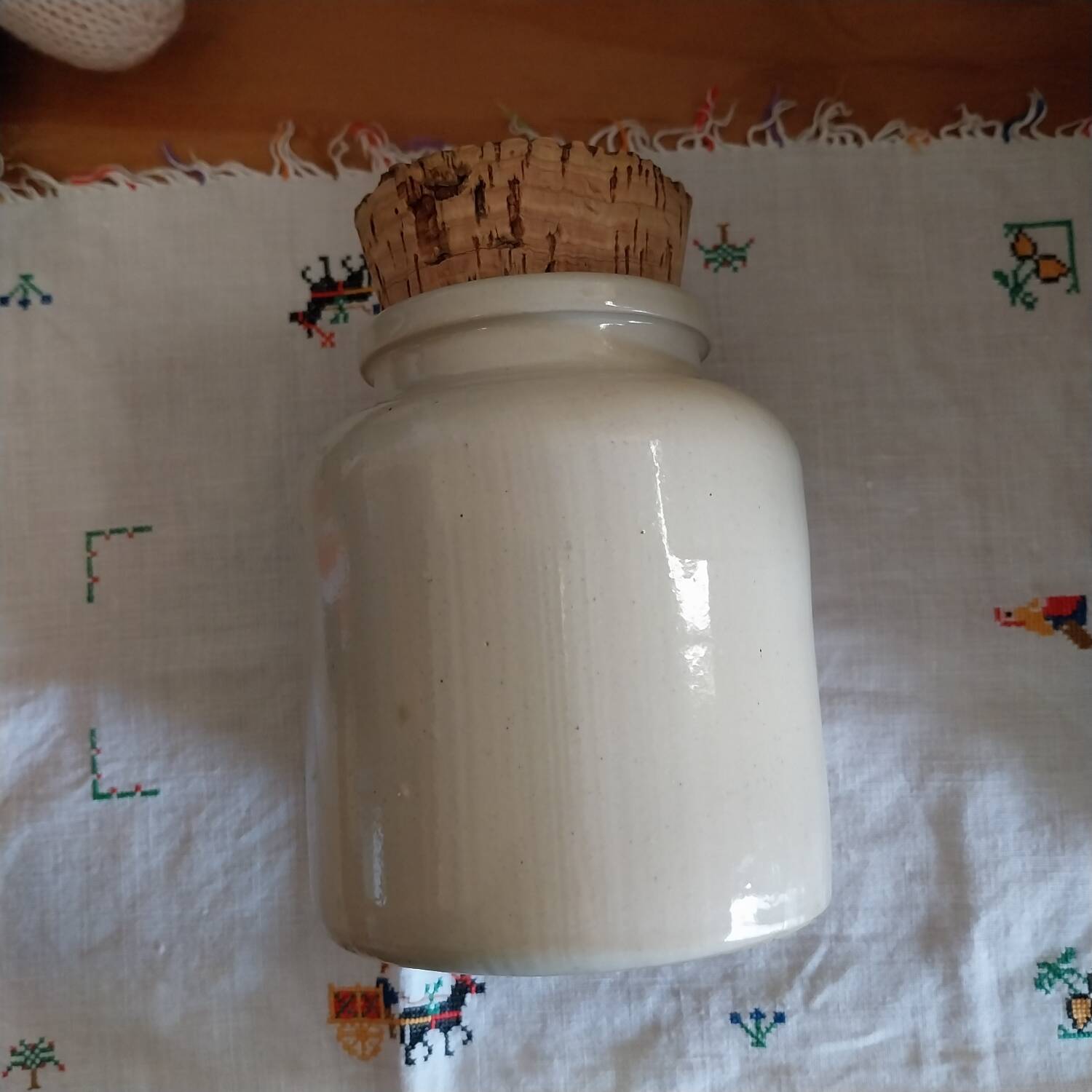 Old beige glazed stoneware pot